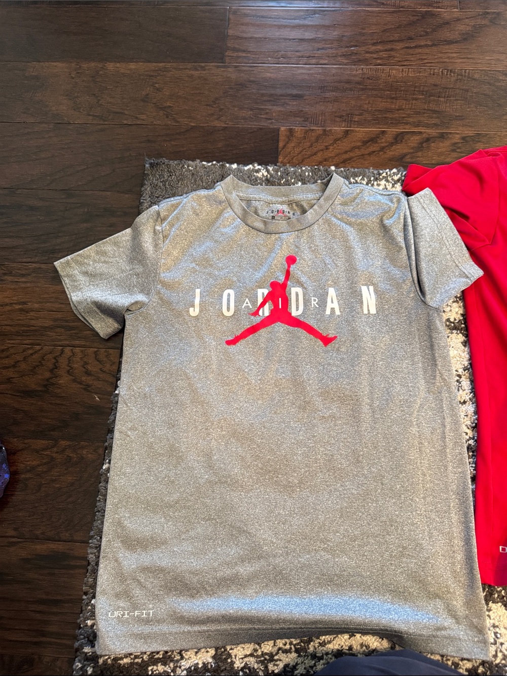 Two Jordan kids tees